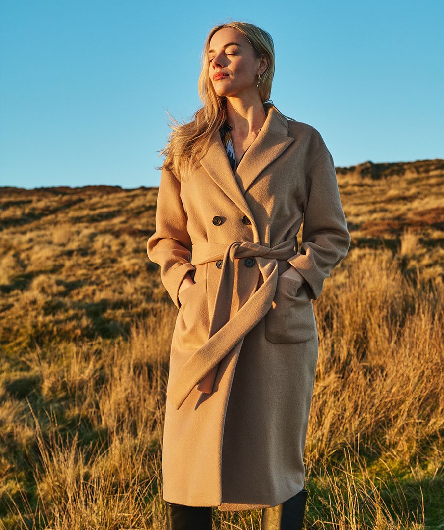 Coat patched pockets